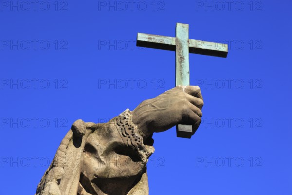 Detail of hand with cross, St John of Nepomuk on the Old Main Bridge, Würzburg, Lower Franconia, Bavaria, Germany