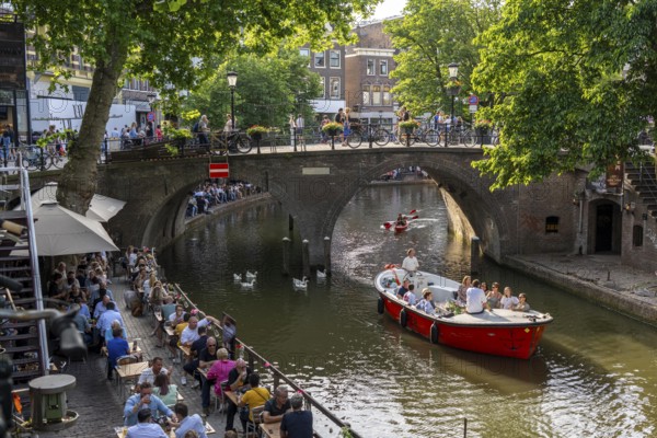 The old town centre of Utrecht, Oudegracht, around 2 km long with many old houses, shops, restaurants directly on the canal, many bridges, boat traffic of all kinds, canal cruise, Netherlands