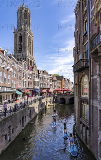 The old town centre of Utrecht, Oudegracht, around 2 km long with many old houses, cathedral tower, highest church tower in the Netherlands, newly renovated, shops, restaurants directly on the canal, many bridges, boat traffic of all kinds, canal tour, Netherlands