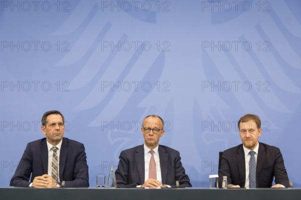 Olaf Lies (SPD, Minister President of Lower Saxony), Friedrich Merz (CDU, Federal Chancellor) and Michael Kretschmer (CDU, Minister President of the Free State of Saxony) during a press conference after the consultation between Federal Chancellor Friedrich Merz and the heads of government of the federal states at the Federal Chancellery, Berlin, 18 June 2025