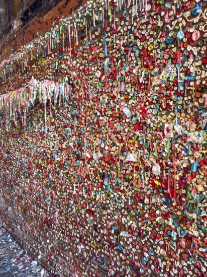 Stone wall with stick-on chewing gum, The Gum Wall, Seattle, Washington, USA, North America