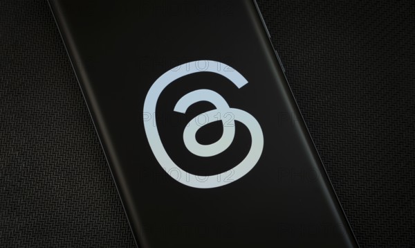 Dhaka, Bangladesh - 18 March 2025: The logo of the threads is displayed on a smartphone screen