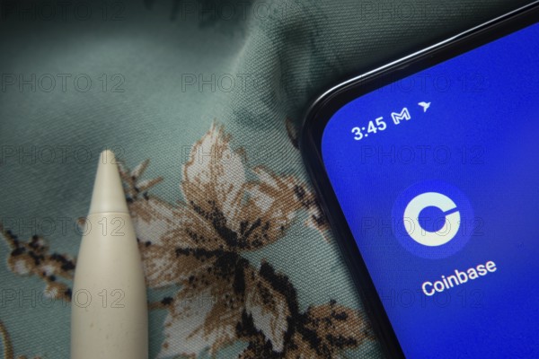 Dhaka, Bangladesh- 07 May 2025: Coinbase app icon is seen on smartphone