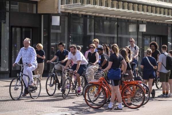 Central cycle path on the Lange Viestraat, lanes for pedestrians, cyclists and local traffic are separated in the city centre, dense traffic, no car/truck traffic, Utrecht, Netherlands