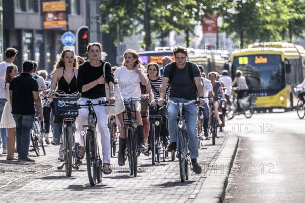Central cycle path on the Lange Viestraat, lanes for pedestrians, cyclists and local traffic are separated in the city centre, dense traffic, no car/truck traffic, Utrecht, Netherlands