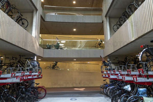 Central bicycle car park at Stationsplein, the largest bicycle car park in the world with over 13, 000 parking spaces on 3 floors, directly below the central station, Utrecht Centraal, Netherlands
