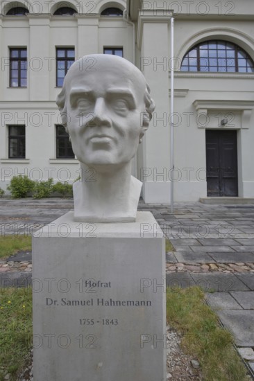 Memorial to the physician, doctor and founder of homeopathy Samuel Hahnemann, sculpture, head, bust, inscription, European Library of Homeopathy, Köthen, Saxony-Anhalt, Germany