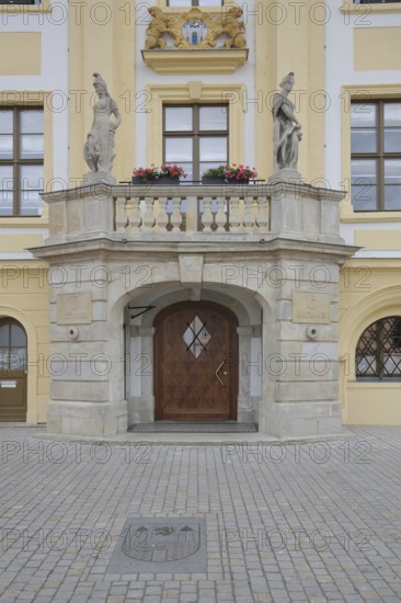 Portal with town coat of arms, figures and decorations from the baroque town hall, market square, Weißenfels, Saxony-Anhalt, Germany