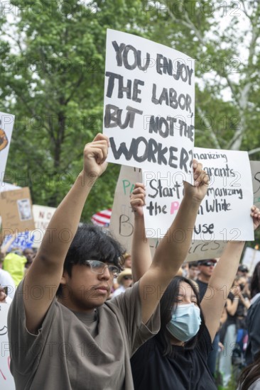 Detroit, Michigan USA - 14 June 2025 - Thousands gathered for a 'No Kings' rally, protesting President Trump's actions against immigrants and against democratic institutions