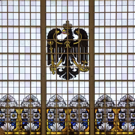 A stained glass window in the railway station with an imperial eagle is a reminder of the imperial era of Wilhelm II in Bad Homburg vor der Höhe, Hesse, Germany