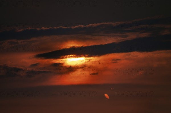 Setting evening sun, rain clouds, Bavaria, Germany