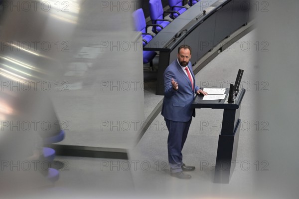 Jens Behrens (SPD) speaks on the agenda item on compulsory livestock labelling at the eleventh sitting of the Bundestag