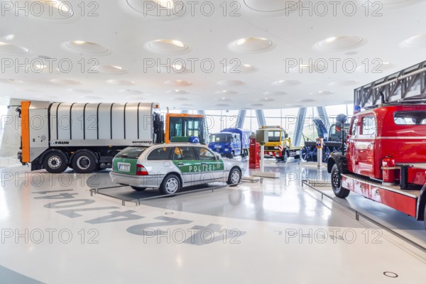 Gallery of helpers with rescue and police vehicles. The Mercedes-Benz Museum in Stuttgart presents a journey through the automotive history of the global corporation. The history of the Mercedes star begins with the first automobile in 1886. 160 vehicles are on display. Stuttgart, Baden-Württemberg, Germany