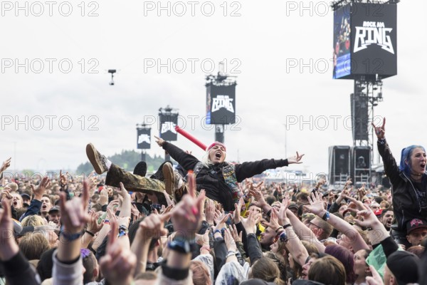 Festival visitor crowdsurfing at the Rock am Ring Festival on Friday, Nürburgring race track race track, 07.06.2025