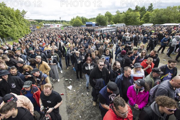 Festival visitors in front of the main entrance at the Rock am Ring Festival on Friday, Nürburgring race track race track, 06.06.2025