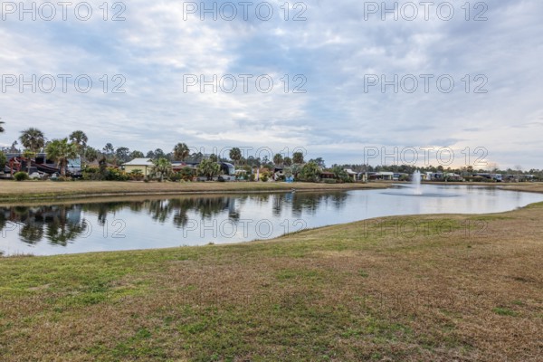 Motorhomes with waterfront lots in RV Resort in southern Alabama, USA