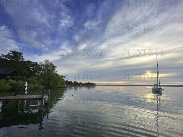 Evening atmosphere, sailing boat on Lake Starnberg, Bavaria, Germany