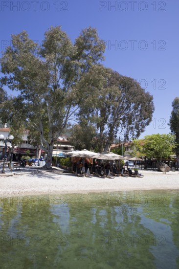 Sun loungers on the beach of Kala Nera on the Pagasitic Gulf, Pelion or Pelion Peninsula, Magnisia, Thessaly, Greece