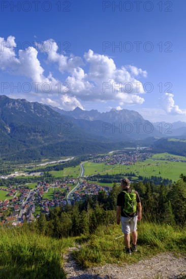 Hiker at the summit, Magdalena Neuner Weg, Krepelschrofen, Wallgau, Werdenfelser Land, Upper Bavaria, Bavaria, Germany