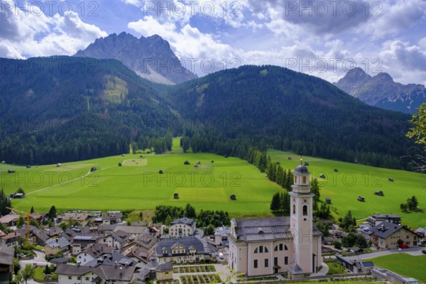 Parish church of St Peter and St Paul, in front of the Sesto Dolomites, Sesto, Sesto Valley, Dolomites, South Tyrol, Italy