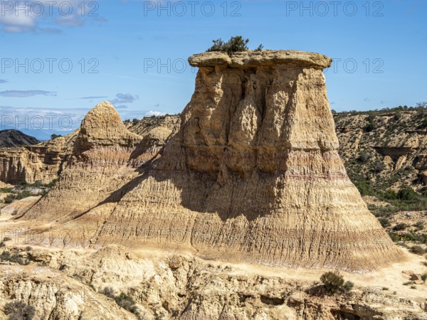 Tozal Solitario rock formation, desert, along gravel road Ruta Jubierre, Desierto de los Monegros, Spain