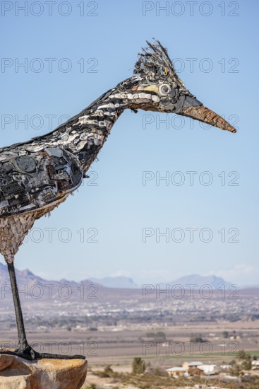 Giant Recycled Roadrunner statue made entirely from discarded materials by artist Olin Calk at an I-10 rest area on the west side of Las Cruces, New Mexico