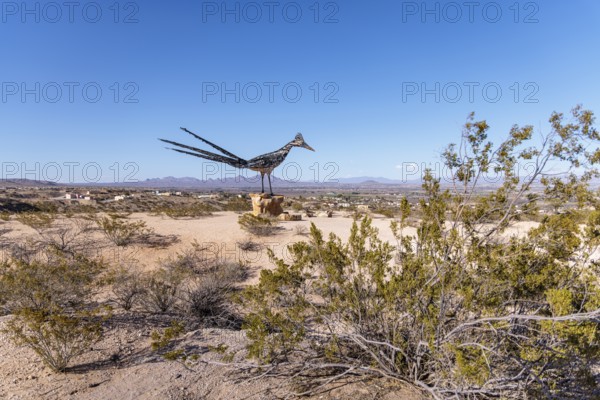 Giant Recycled Roadrunner statue made entirely from discarded materials by artist Olin Calk at an I-10 rest area on the west side of Las Cruces, New Mexico