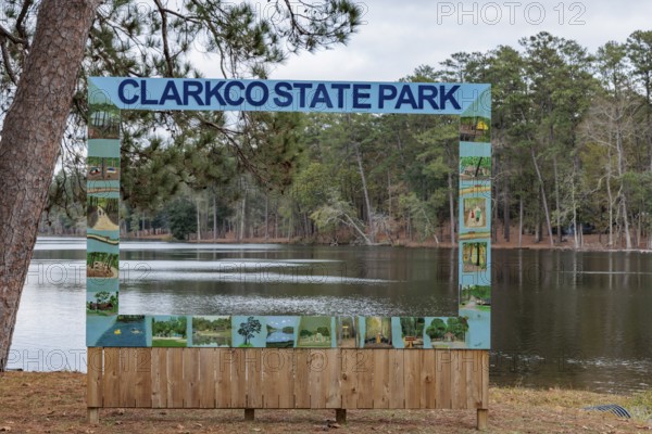 Permanent painte wooden photo prop beside Lake Ivy at Clarko State Park near Quitman, Mississippi, USA