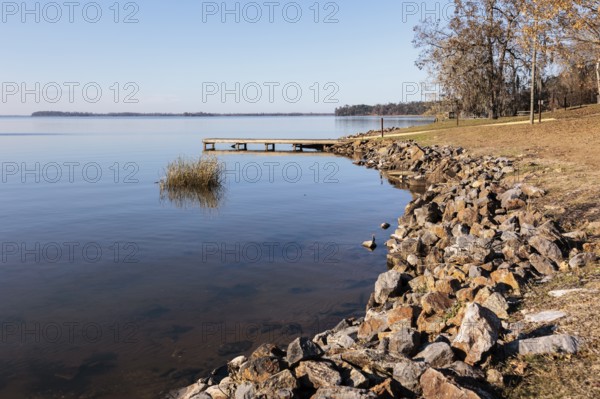 Small wooden dock and boat ramp on Lake Seminole at the Corps of Engineers Eastbank Campground near the Florida state line in Georgia