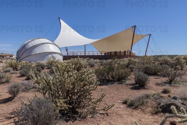 Shade structures provide visitors relief from the desert sun at Eagle Point in Grand Canyon West near Peach Springs, Arizona
