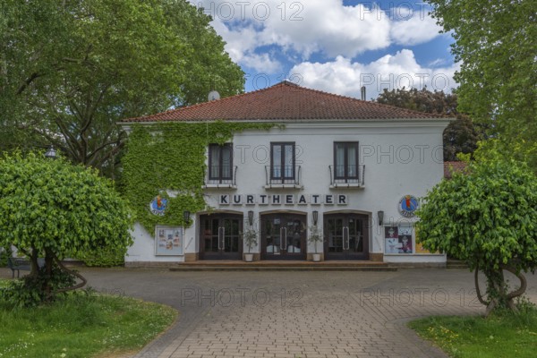 Entrance area to the spa theatre, Bad Sooden, Allendorf, Bad Sooden district, cinema, cultural centre, entertainment, leisure, fun, lawn, trees, blue sky, clouds, Werra-Meissner district, Hesse, Germany