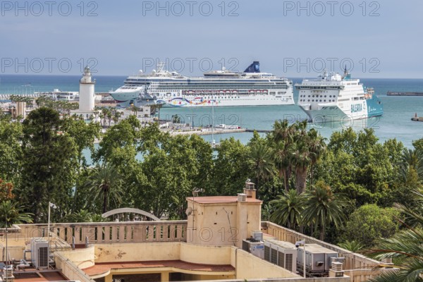 Cruise ship in the harbor of Malaga, lighthouse, Malaga, Andalusia, Spain