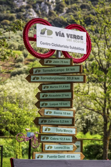 Decorated signpost, cycle path Via Verde Del Aceite, village Dona Menica, Andalusia, Spain