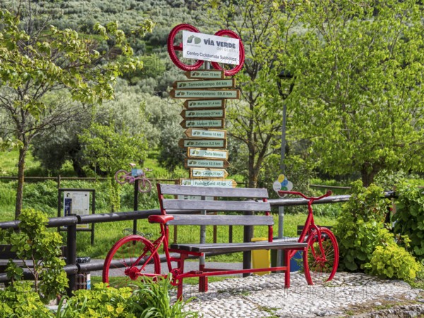 Decorated signpost, cycle path Via Verde Del Aceite, village Dona Menica, Andalusia, Spain