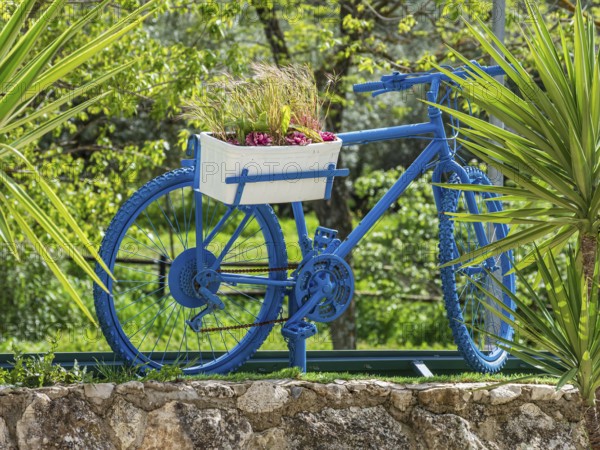 Decorated bicycle, cycle path Via Verde Del Aceite, village Dona Menica, Andalusia, Spain