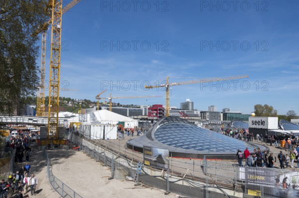 Open days at the new main railway station, Stuttgart 21, overview of the construction site with glass roof and several cranes, city in the background, glass dome, construction site of the new Stuttgart 21 railway station, Stuttgart, Baden-Württemberg, Germany