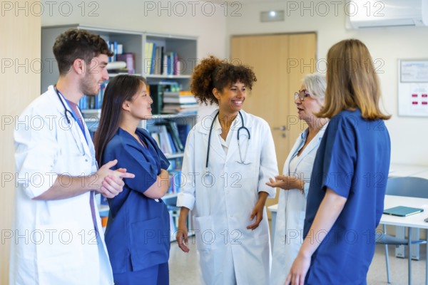 Diverse medical professionals collaborating, sharing expertise, and strategizing for optimal patient care within a hospital environment