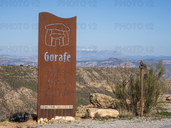 Signpost at the Gorafe megalithic park, Gorafe desert, Andalusia, Spain