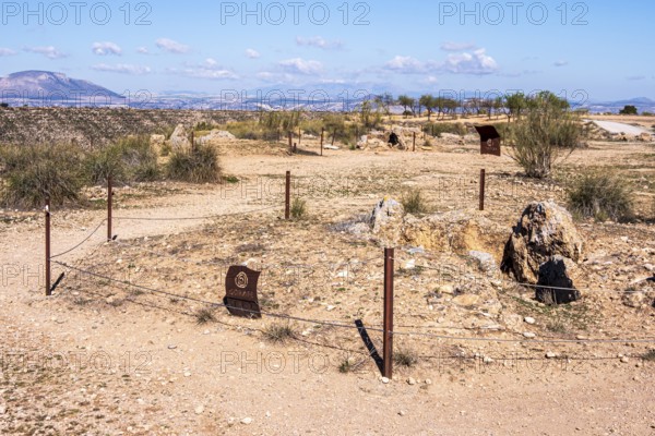 Signpost at the Gorafe megalithic park, megalithic grave, Gorafe desert, Andalusia, Spain