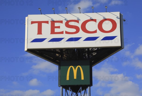 Advertising medium of the supermarket chain Tesco, a British supermarket chain and the United Kingdom's largest retail chain, including advertising for McDonalds, here a branch in Cheb, Cheb, Czech Republic (editorial use only)