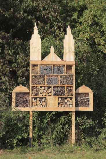 Insect hotel, artificially created shelter, nesting aid and overwintering aid for insects in the shape of Fulda Cathedral, Hesse, Germany