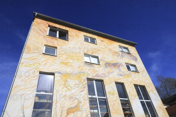 Burning wall, Ideenhaus, artistic design Axel Luther, Hollfeld, Bayreuth district, Upper Franconia, Bavaria, Germany