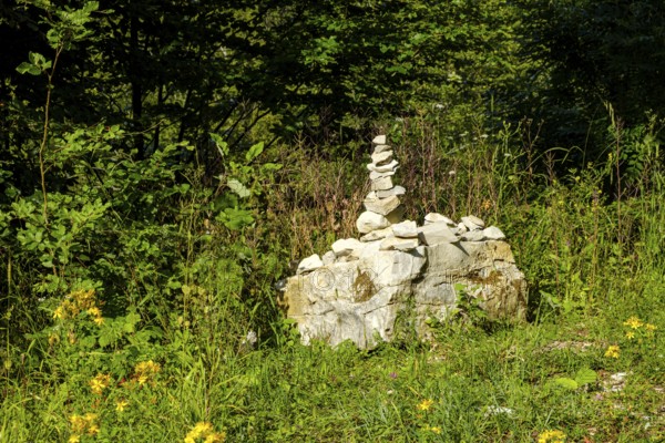 Cairn to mark the edge of the path, near the Schertelshöhle cave, Swabian Alb, Germany