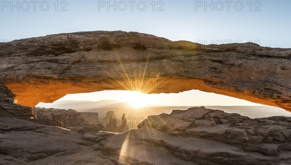 View through Natural Arch, Mesa Arch, Sunrise, Grand View Point Road, Island in the Sky, Canyonlands National Park, Moab, Utah, USA