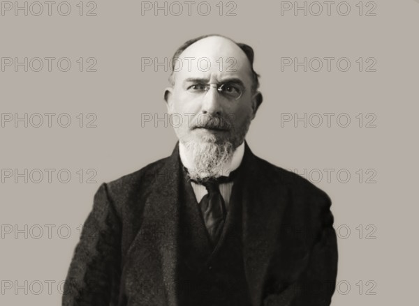 Erik Satie, 1866 – 1925, a French composer and pianist, portrait digitally edited according to a photography