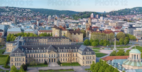 City view of Stuttgart. Aerial view. City centre on the Schlossplatz with New Palace, Old Palace and Collegiate Church. Stuttgart, Baden-Württemberg, Germany