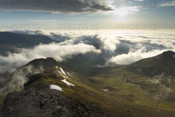 Clouds moving in, summit area of Mt Slættaratindur, Eysturoy, Faroe Islands, Denmark