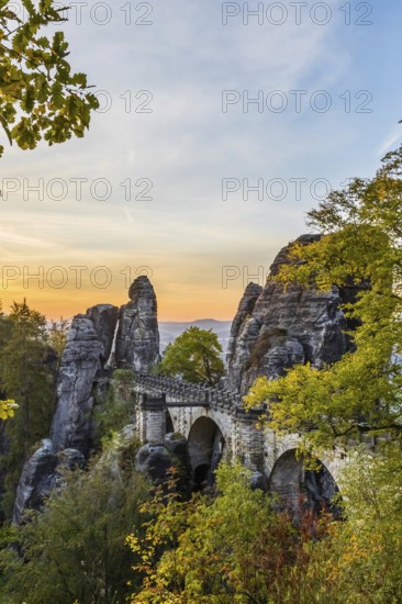Federal Republic of Germany, Germany, Saxon Switzerland in Saxony, View of the Bastei Bridge at sunrise, Autumn, Saxon Switzerland, Saxony, Federal Republic of Germany