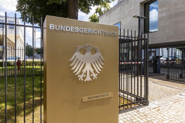 The Federal Court of Justice (BGH) is the highest court of the Federal Republic of Germany in the area of ordinary jurisdiction and thus the final instance in civil and criminal proceedings. Official sign with federal eagle at the seat of the court in Karlsruhe, Baden-Württemberg, Germany