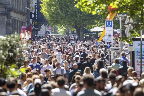 Many people on the way in the pedestrian zone Königsstraße. Crowd in Stuttgart, Baden-Württemberg, Germany